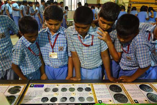 school students in history exhibition